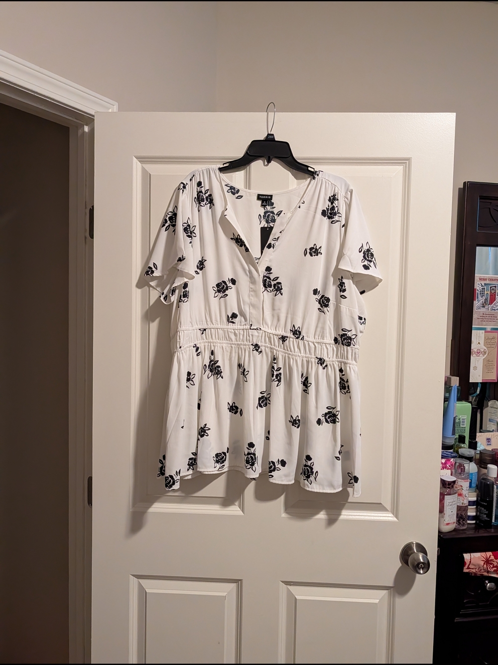 Women’s White Peplum Top with Black Floral Print